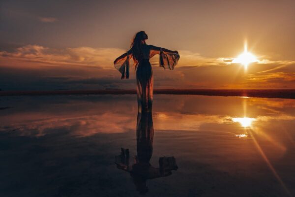 Girl on sunset beach