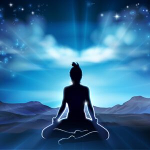 A woman in a yoga or Pilates pose in silhouette with the sunrise behind her in the desert